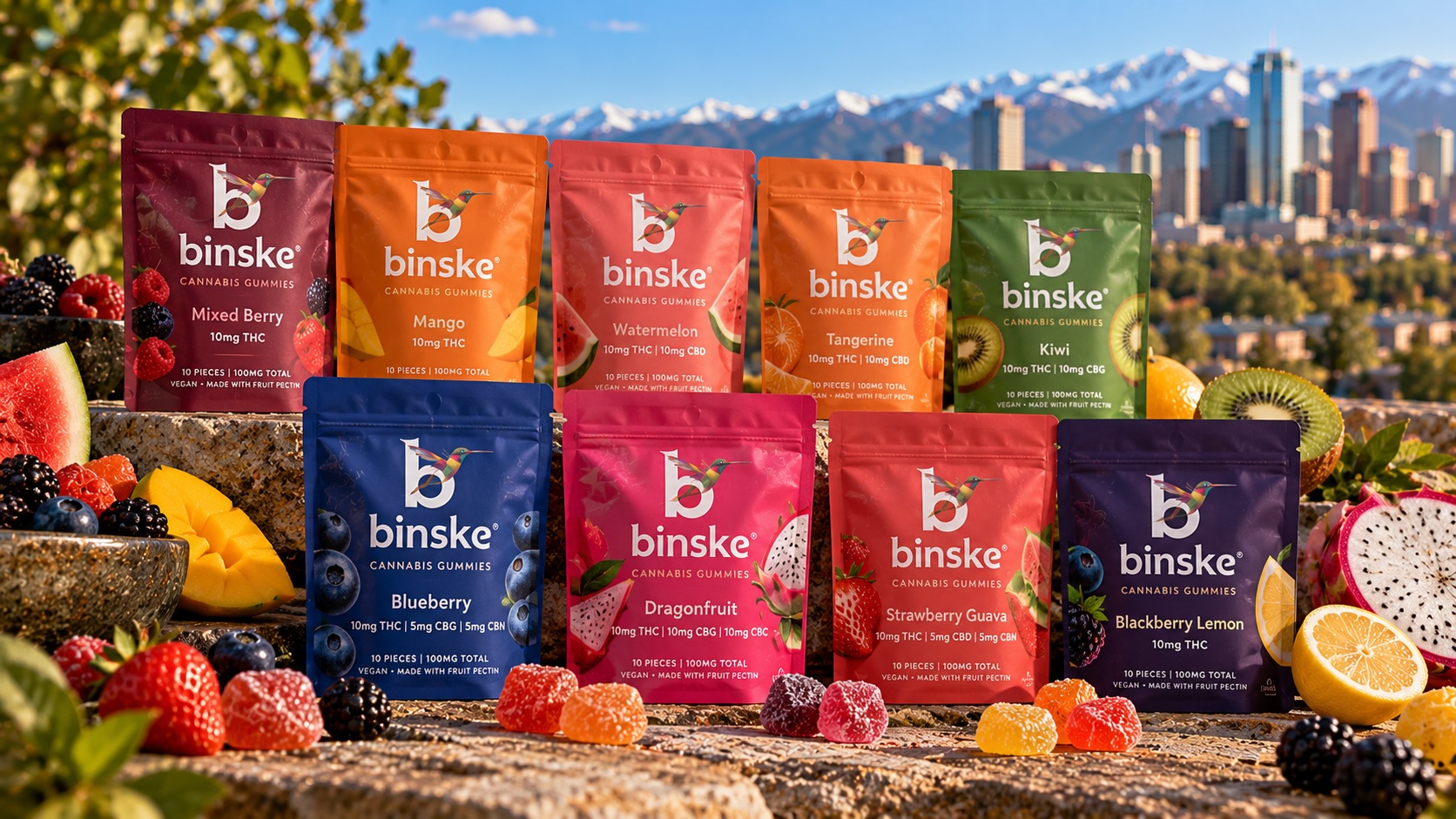 binske fruit gummies in nine flavors arranged beside their resealable bags on a white table